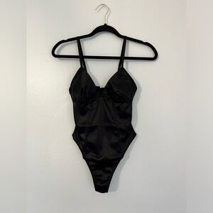 Women's black bodysuit, extra small size, Forever 21 brand.